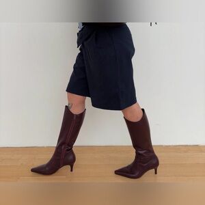 Dark Shorts with Burgundy Knee-High Boots